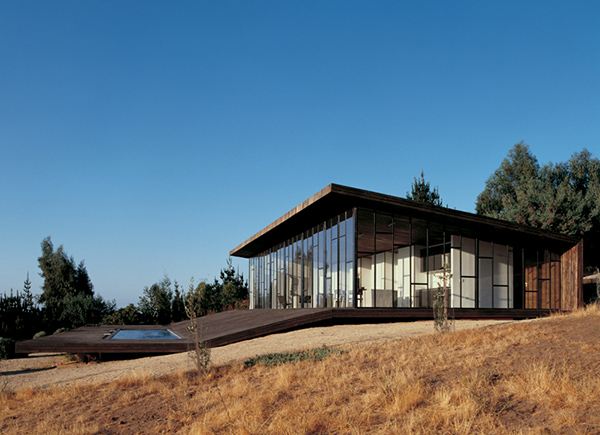 Wooden Home Design - wrap around deck house in Chile is literally wrapped ... in deck