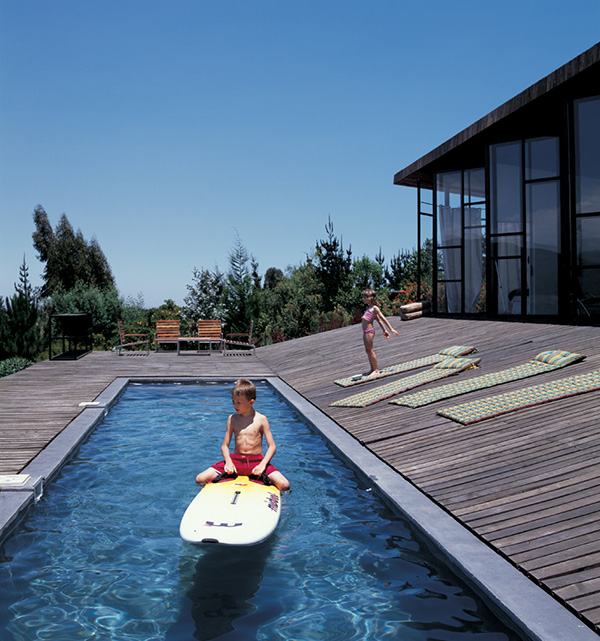 Wooden Home Design - wrap around deck house in Chile is literally wrapped ... in deck