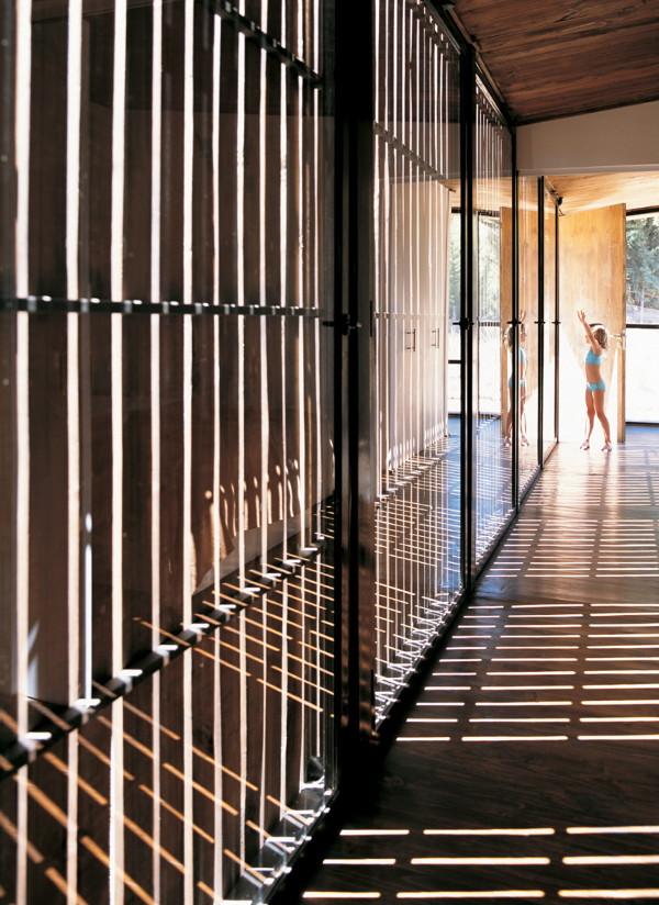 Wooden Home Design - wrap around deck house in Chile is literally wrapped ... in deck