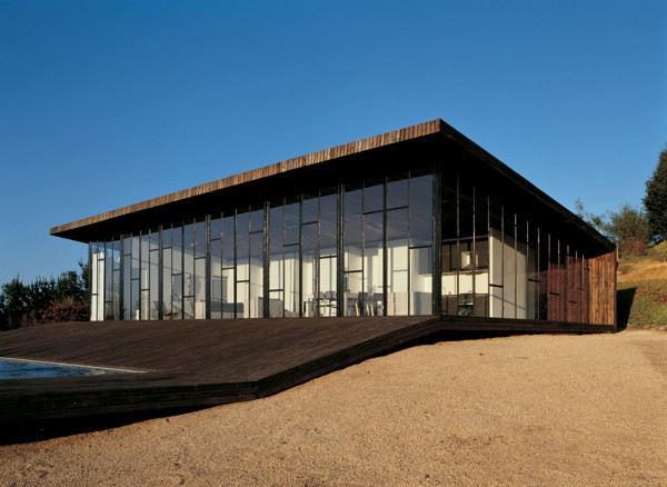 Wooden Home Design - wrap around deck house in Chile is literally wrapped ... in deck