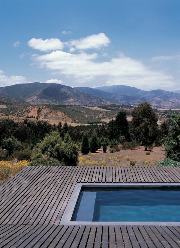 Wooden Home Design - wrap around deck house in Chile is literally wrapped ... in deck