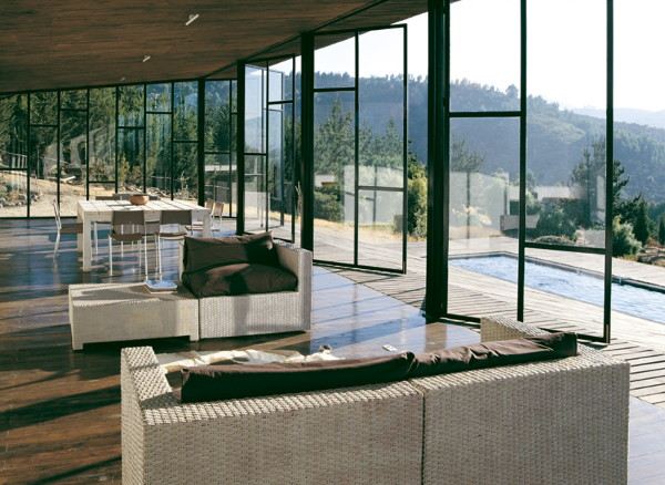 Wooden Home Design - wrap around deck house in Chile is literally wrapped ... in deck