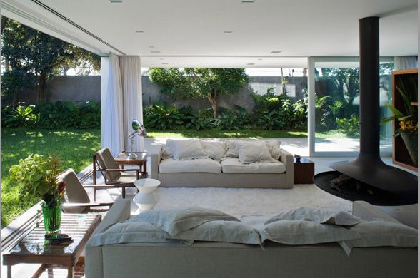 Stylish Home Design in Sao Paulo, Brazil - a rooftop deck, a lap pool and a cool basement