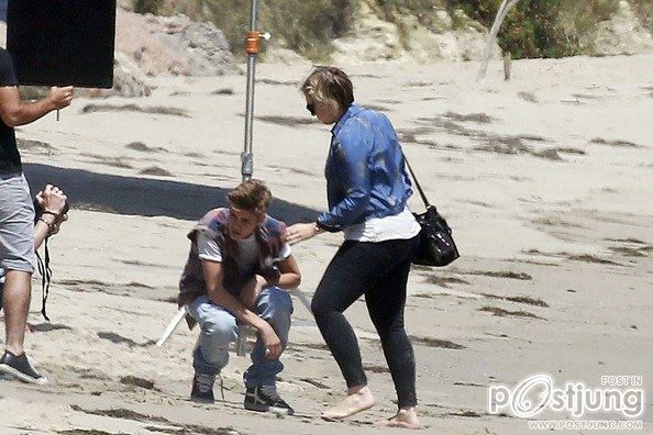 Justin Bieber poses for a photoshoot on the beach in Malibu