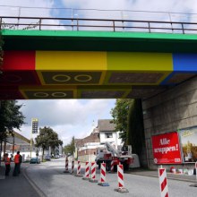 Street Artist ‘Megx’ Creates Giant Lego Bridge in Germany