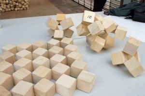 7000 wooden cubes linked together in an inverted question-cube
