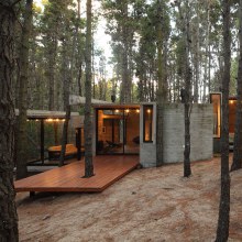 A Forest Hideaway Proves Concrete And Cozy Can Go Together