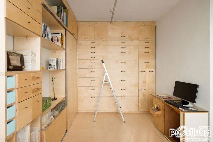 An Organizer's Dream: An Art Studio with Color-Coded Built-In Storage by Meredith Swinehart