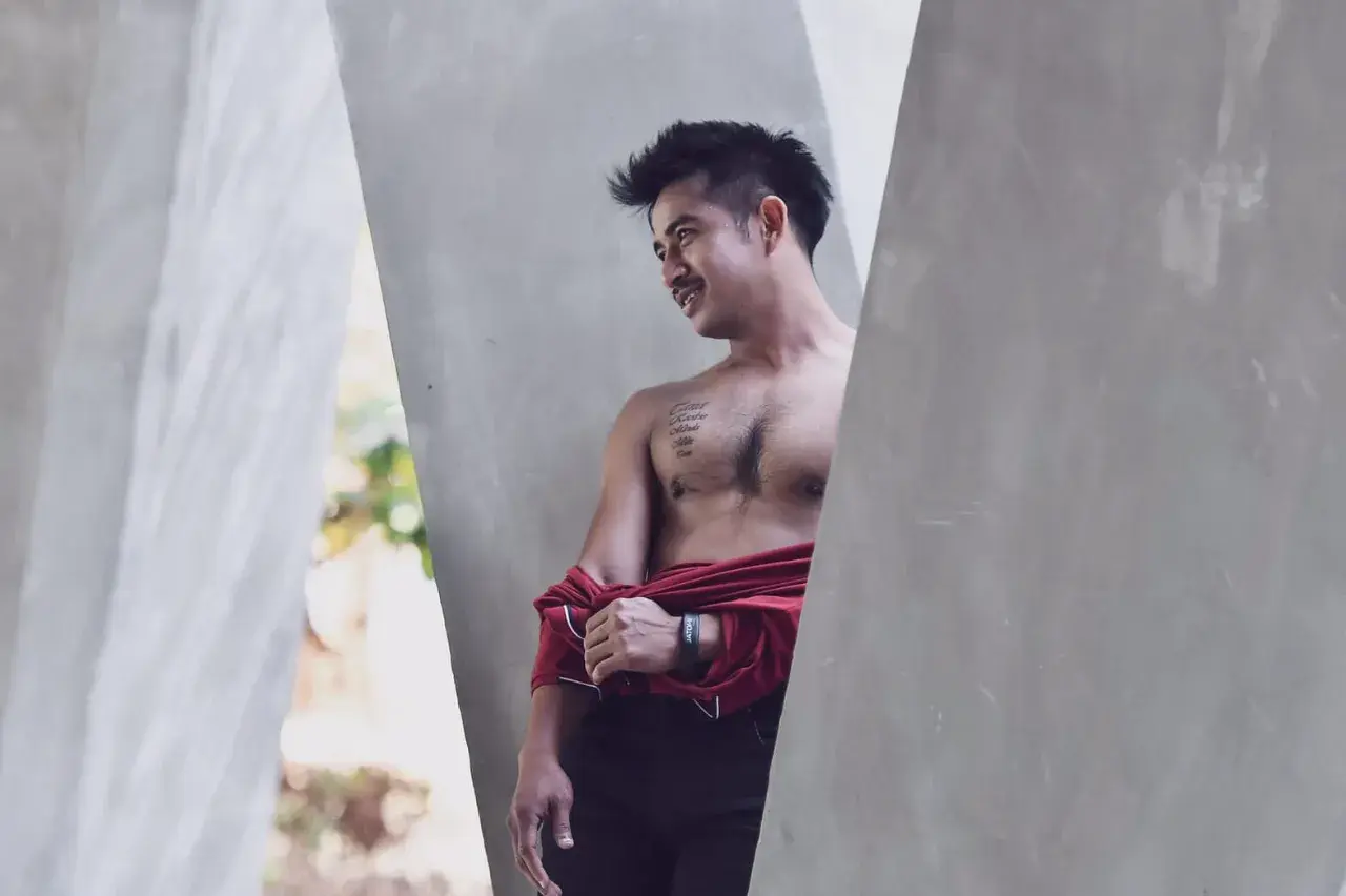 แมน ธนา ชะนะบุตร อดีตนักฟุตบอลทีมชาติไทย.