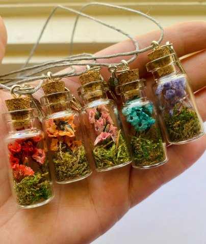 a necklace with dried flowers that can make potions