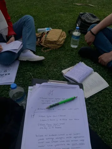 Sitting doing homework with friends