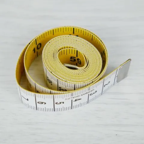 measuring tape . สายวัด