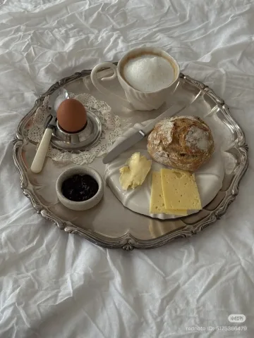 Bread, cheese, egg, butter , coffee