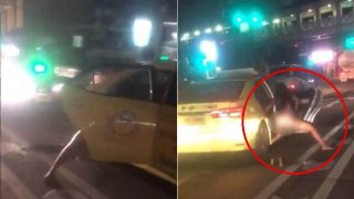 ไม่ได้แอบถ่าย! สาวเปิดประตูรถแท็กซี่ "ฉี่กลางสี่แยก" แบบไม่สนใคร