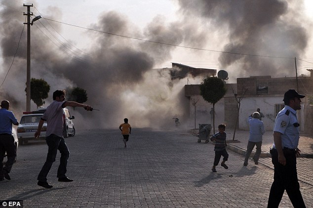 หลักประกันความเสียหาย: ระเบิดครกยิงจากซีเรียตีพื้นที่ชายแดนทางตะวันออกเฉียงใต้ของตุรกีของ Akcakale ห้าฆ่า