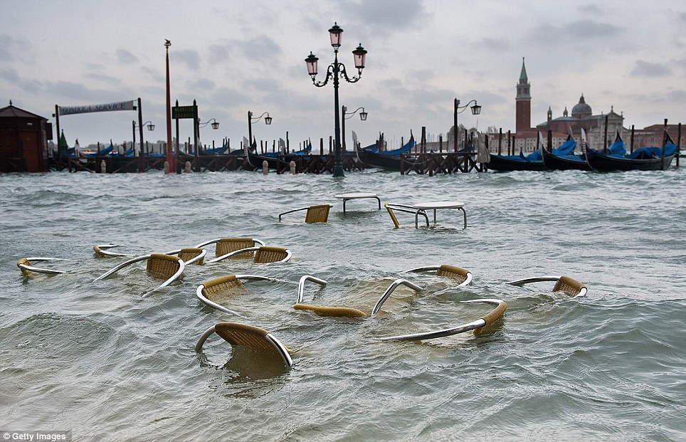 Washed out: The view towards St Mark′s Basin looks a little different from normal. More 
than 70 per cent of Venice has been left flooded after the city was hit by a high tide