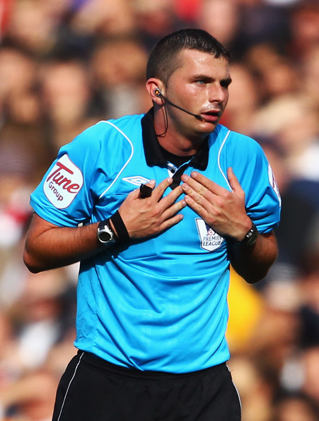 Michael Oliver Referee Michael Oliver gestures during the Barclays Premier League match between Arsenal and West Bromwich Albion at the Emirates Stadium on September 25, 2010 in London, England.