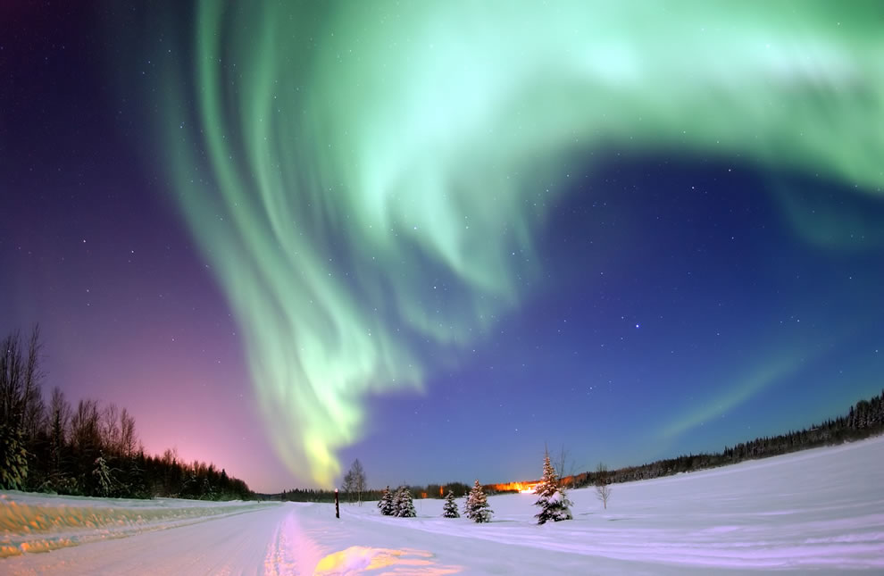 Arctic portal Eielson Air Force Base Alaska-—-The Aurora Borealis or Northern Lights shines above Bear Lake