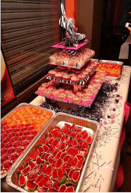 PARTY IDEAS! Jello Shooters/ Shots! Mmmm Cocktails! Candy! Watermelon, orange, strawberry, swedish fish, sour patch gummies! I also made the cupcake tower using canned food and wrapping paper! SO easy and perfect for the PINK CHAMPAGNE Zebra cupcakes! AMAZING!