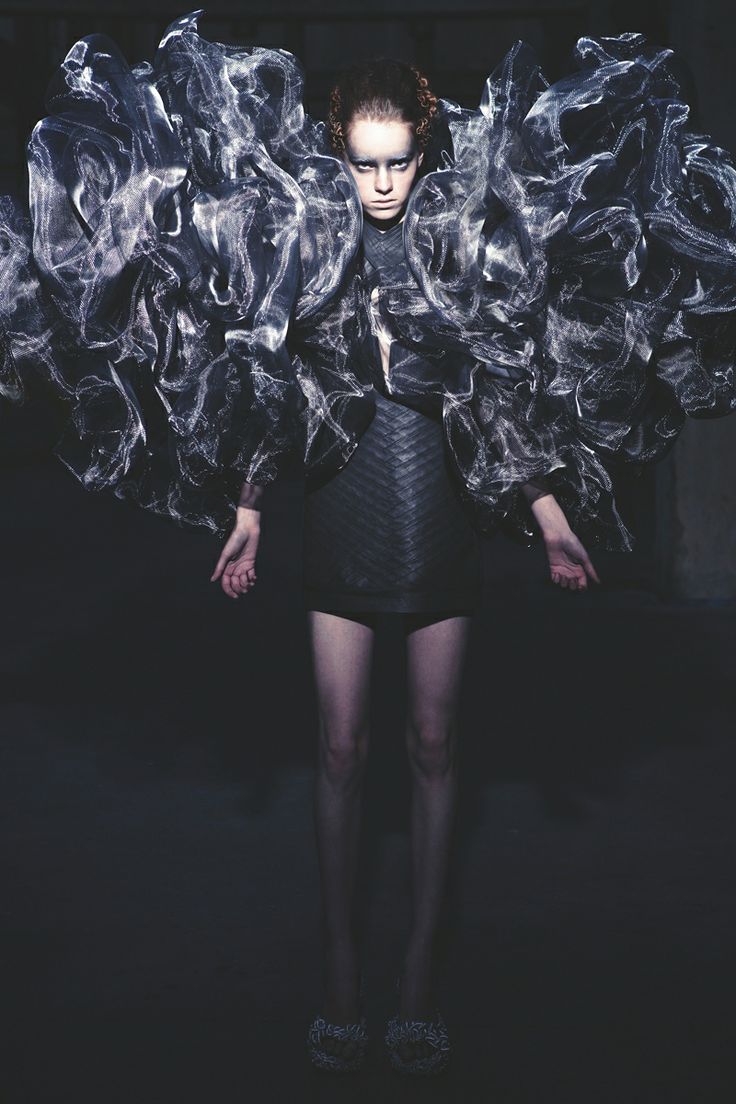 A garment from Iris Van Herpen's 'Refinery Smoke' Collection. I love how the sleeves of this dress look so delicate and EXACTLY like smoke! The tight fit of the dress creates a juxtaposition and further emphasises the spectacular smokey top portion. Wow she has so much talent!