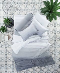 ผ้าปูที่นอนสีเทา