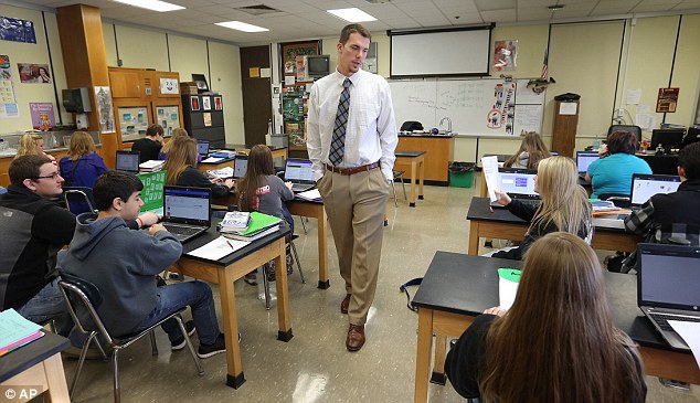 Back to school: Professional baseball pitcher Alex Meyer spends his off-season substitute teaching. Pictured above subbing at Greensburg High School where he once attended