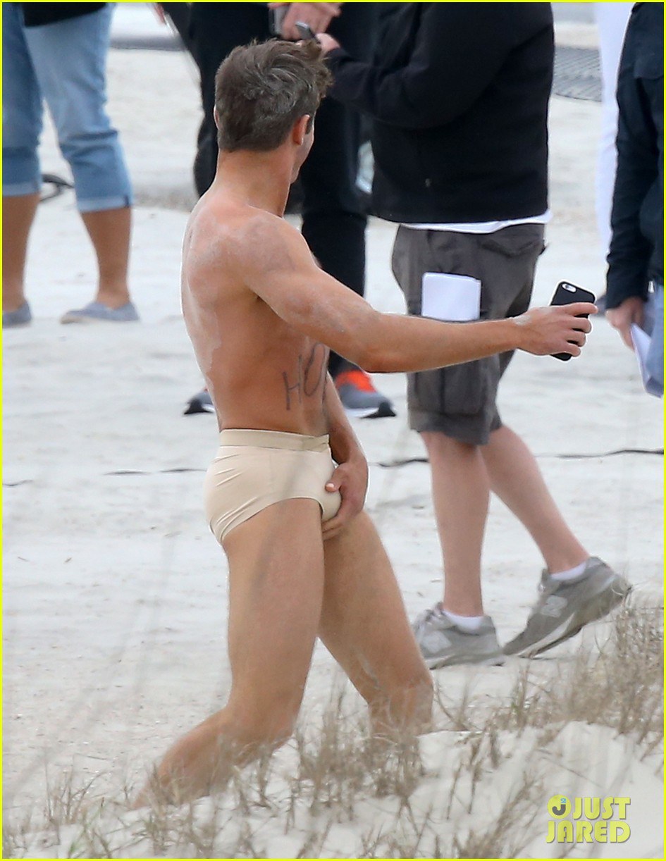 zac efron shirtless nearly naked on set 01