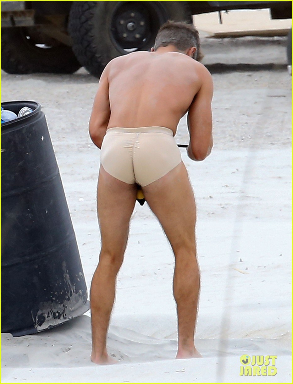 zac efron shirtless nearly naked on set 01