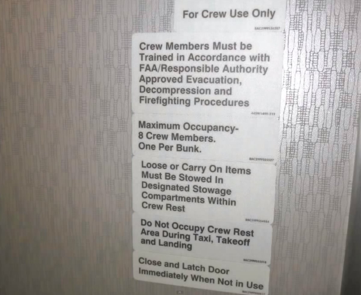 passengers-arent-allowed-in-there-this-tiny-door-is-in-the-main-area-of-the-plane
