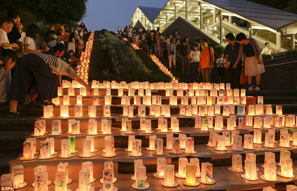 2B33251800000578-3190472-Touching_Thousands_observed_a_vigil_at_the_Nagasaki_Peace_Park_t-a-47_1439059868799