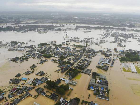 An aerial view shows residential areas  flooded by the Kinugawa river, caused by typhoon Etau in Joso