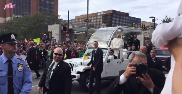 He stopped and laughed when he caught sight of Quinn Madden, aka Baby Pope.