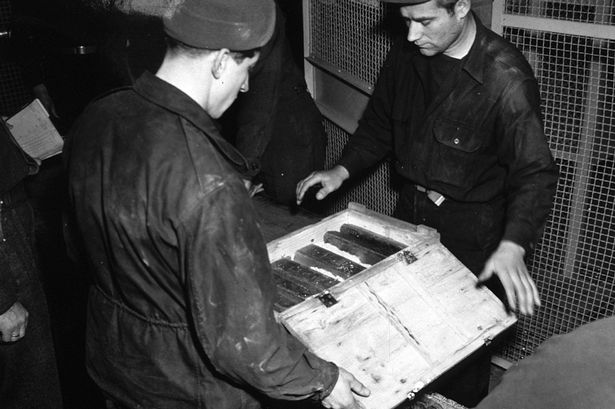 Workers-Inspects-Gold-Bars-Taken-From-Jews-By-The-Nazis-And-Stashed-In-The-Heilbron-Salt-Mines