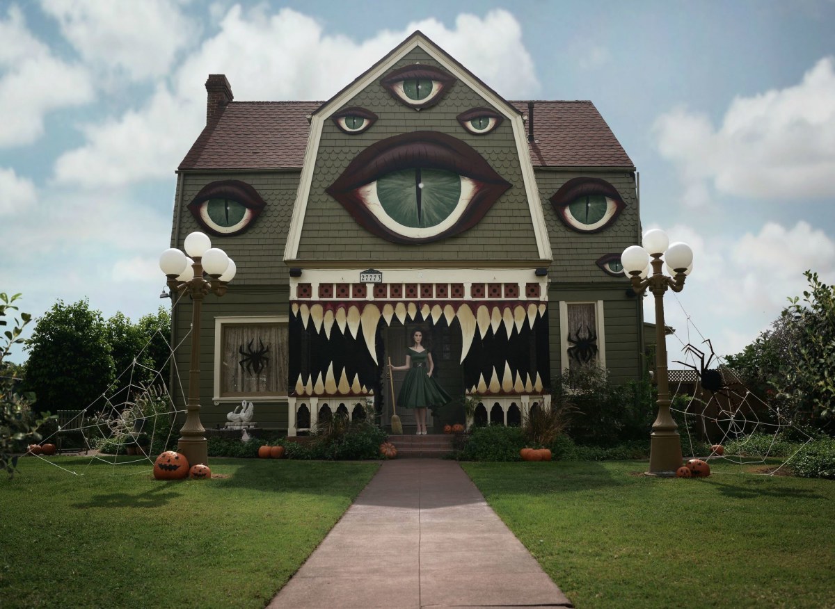 McConnell spent four 12-hour days transforming the home. The eyes and fangs were made of foam-core boards. There are also jack-o-lanterns, spiders, and an unmissable set of fangs.