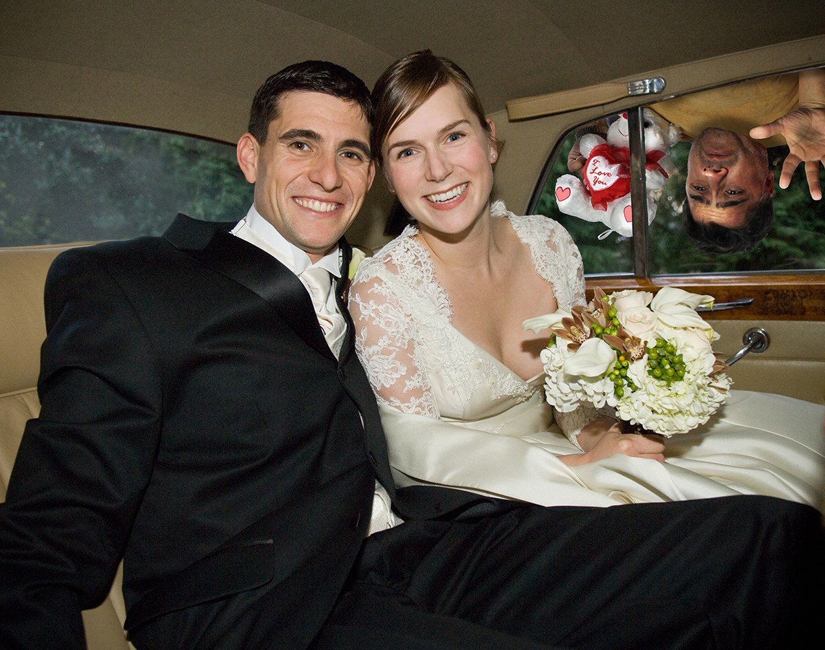 Bride and groom in car, portrait