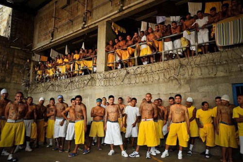 Members of the MS-18 gang incarcerated in Izalco mens' prison in El Salvador inside pass the afternoon in the prison yard.